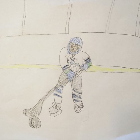 My dad with the puck, Tacoma, Washington, Age 7